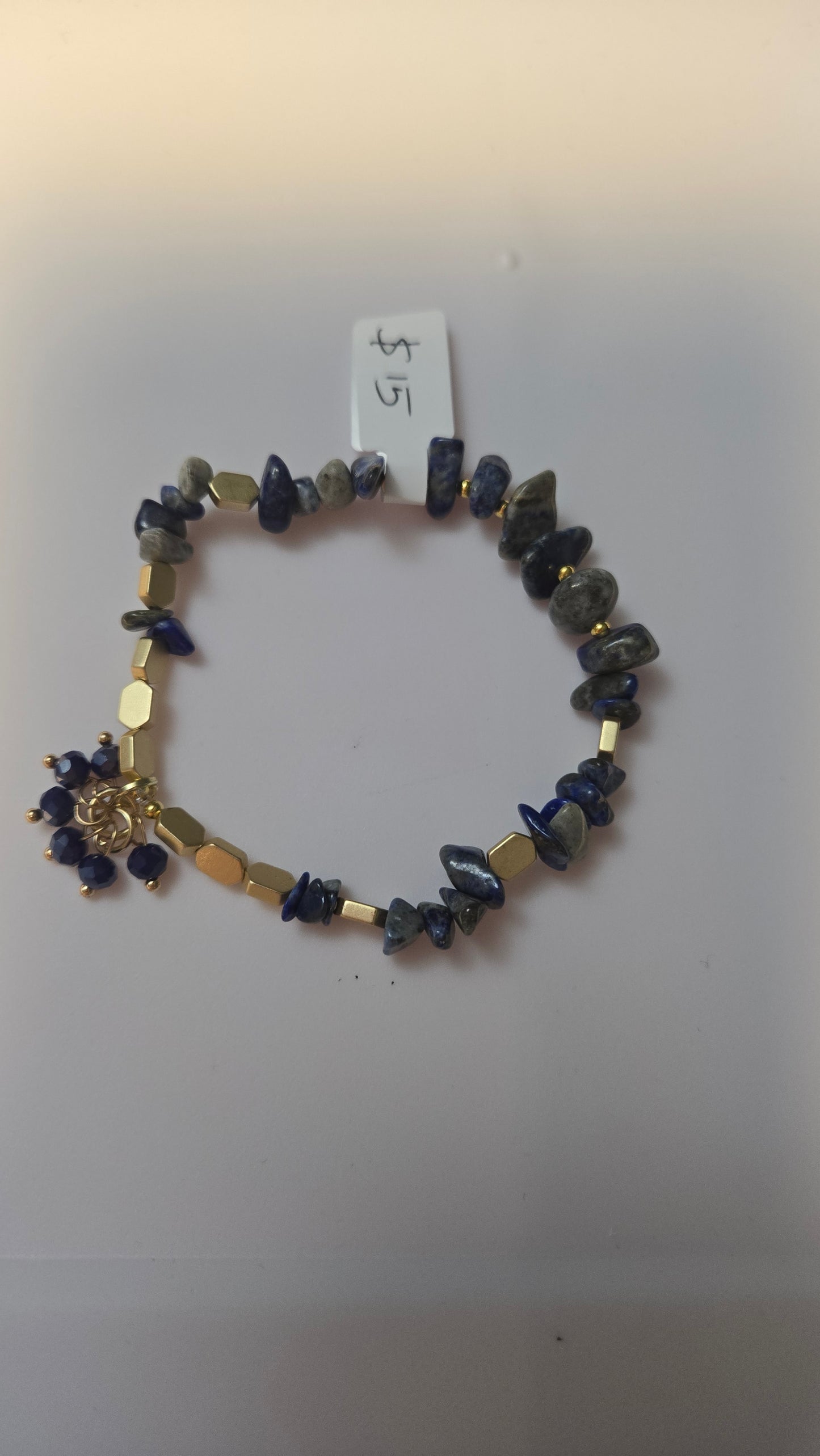 LuluTouch Blue Serenity Handmade Bracelet featuring natural stones and gold accents on a wrist.