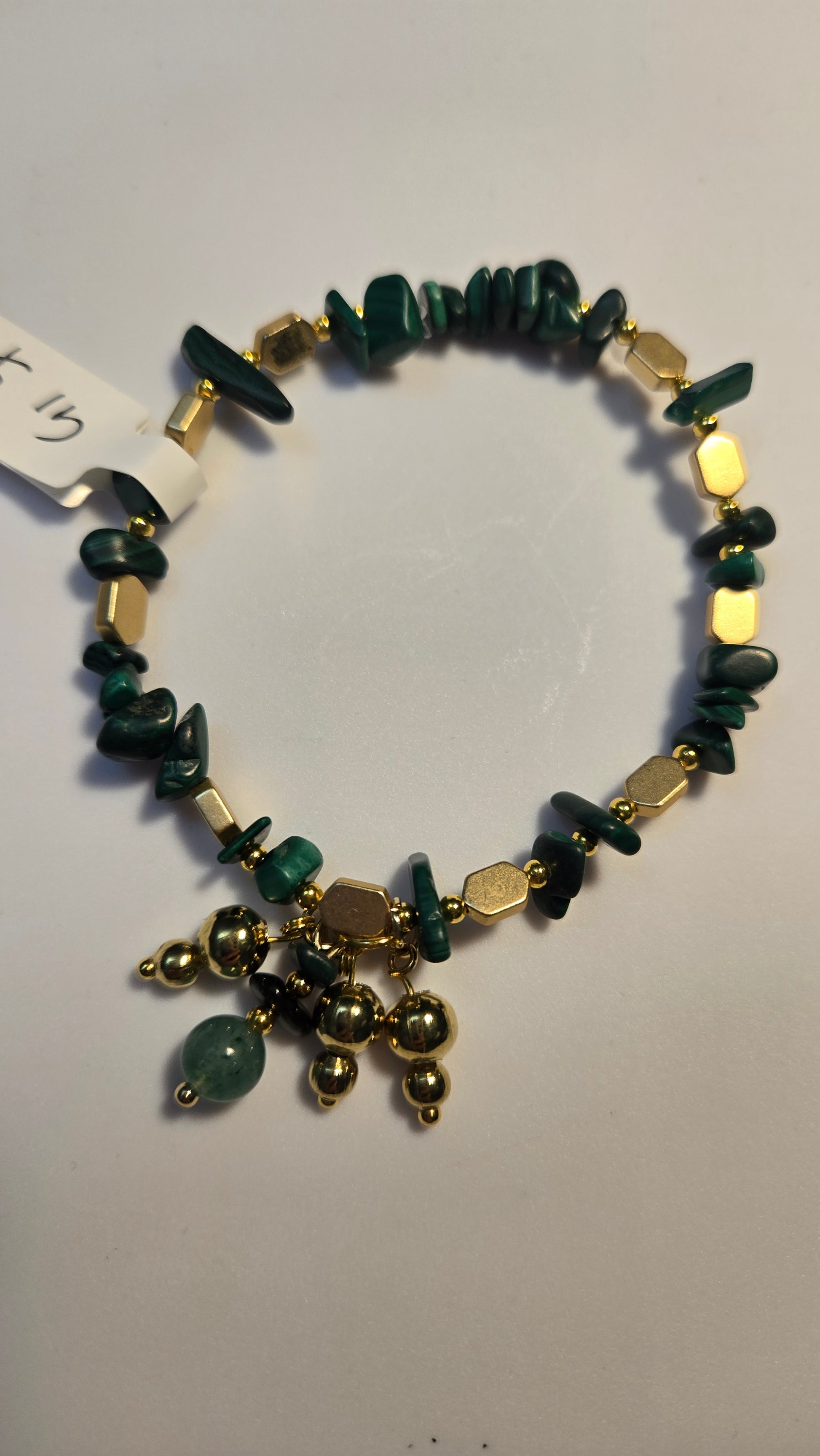 Green Aura Bracelet displayed elegantly against a soft background