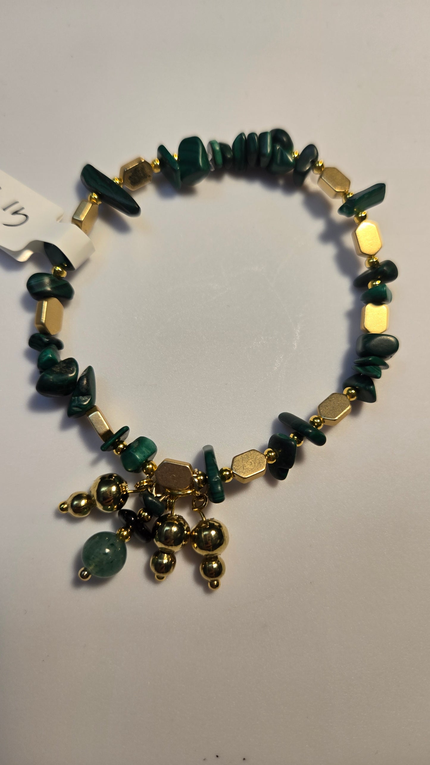 Side view of the Green Aura Bracelet highlighting its adjustable features