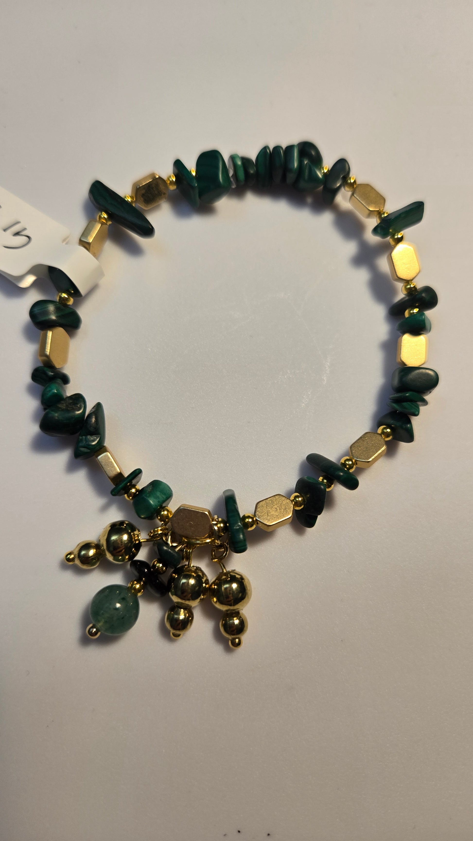 Side view of the Green Aura Bracelet highlighting its adjustable features