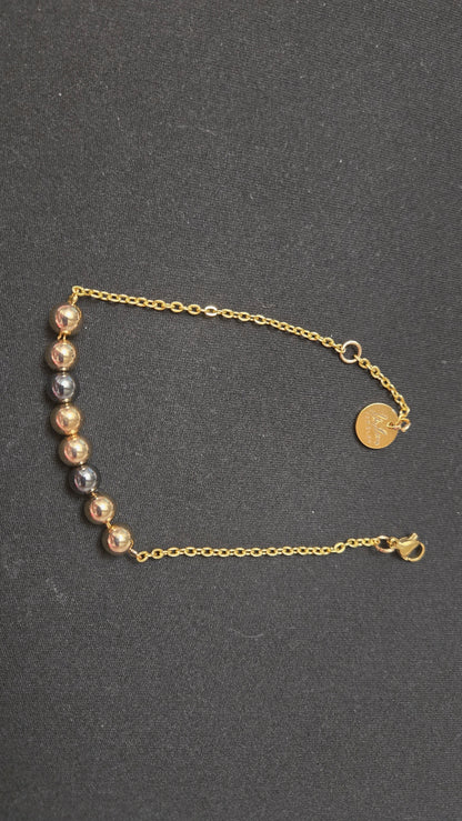 Mixed-Tone Bracelet with gold-tone chain, metallic beads and a round charm, view 2