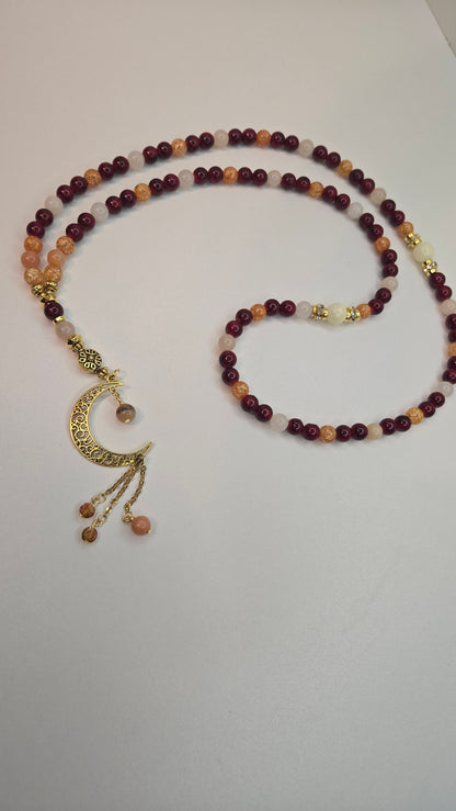 Golden Sunset Tasbih with red, orange and cream beads and a gold-tone crescent moon charm, view 5