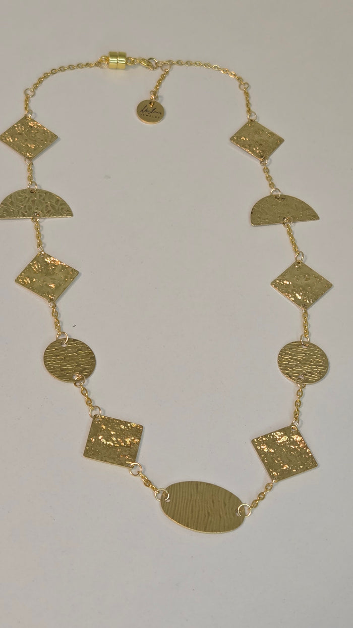 Golden Geometry Necklace with hammered gold-tone circles, half-circles and squares