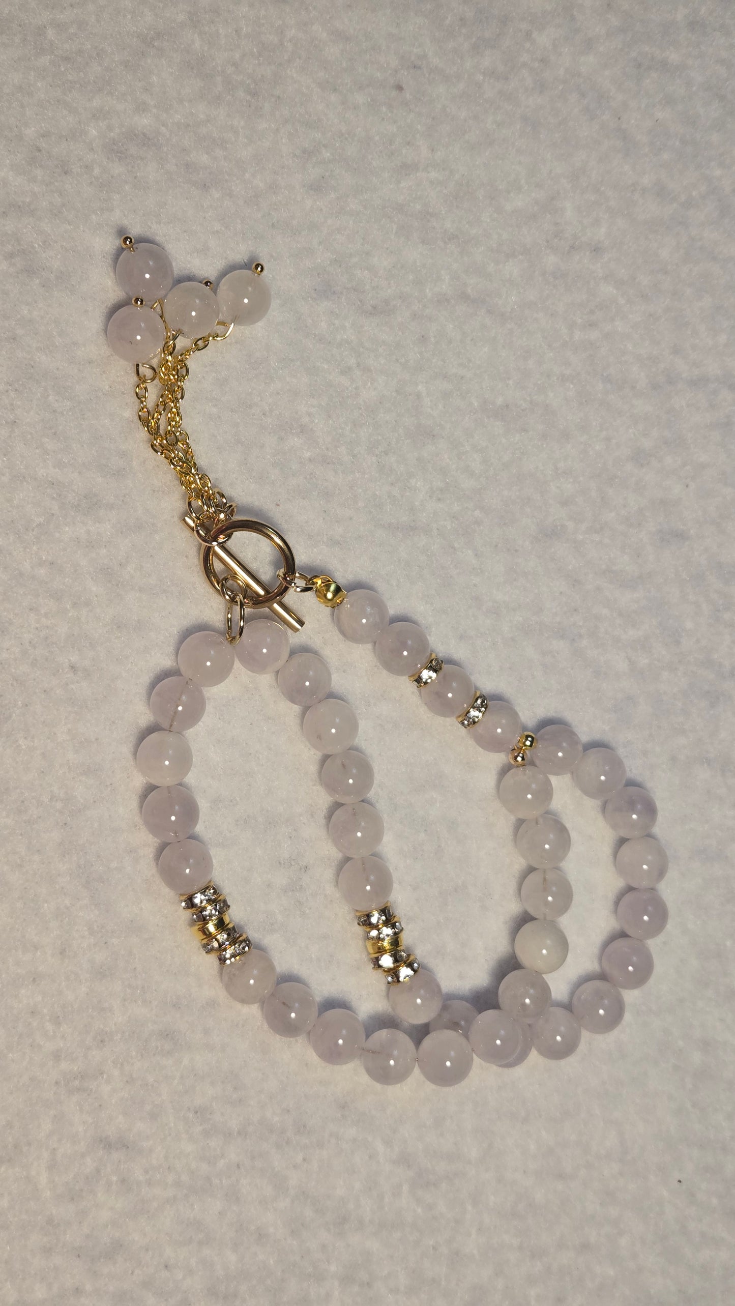 Amethyst Princess Tasbih handmade spiritual jewelry, showcasing natural lavender amethyst beads and elegant gold accents.