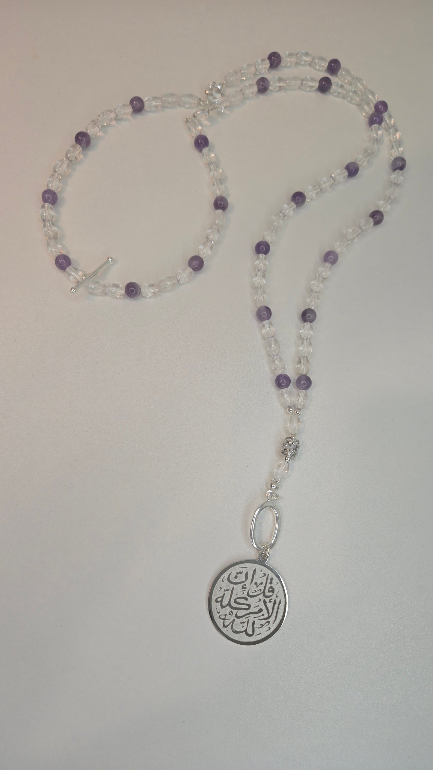 Elegant Amethyst Tasbih worn as a necklace