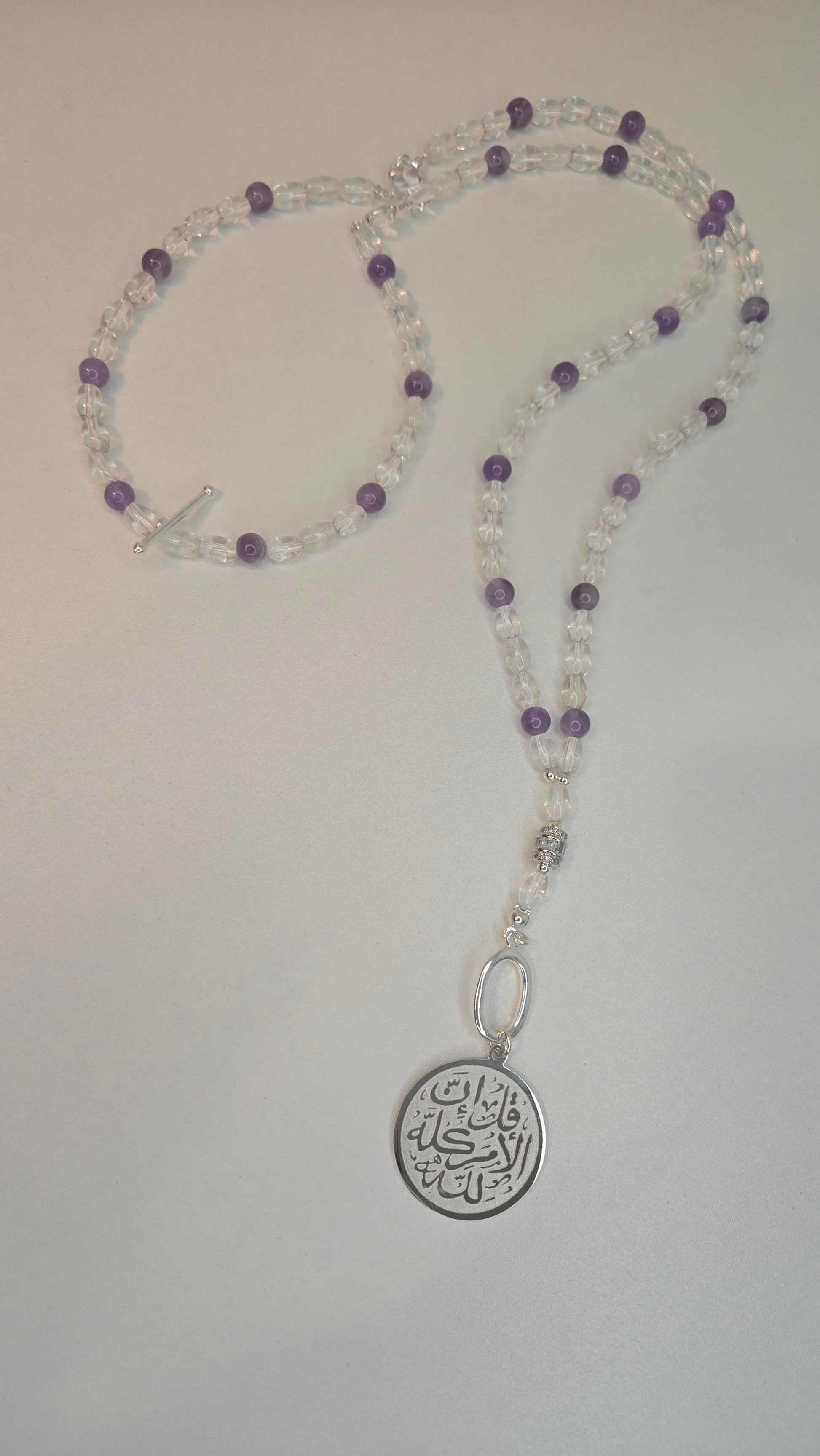 Elegant Amethyst Tasbih worn as a necklace