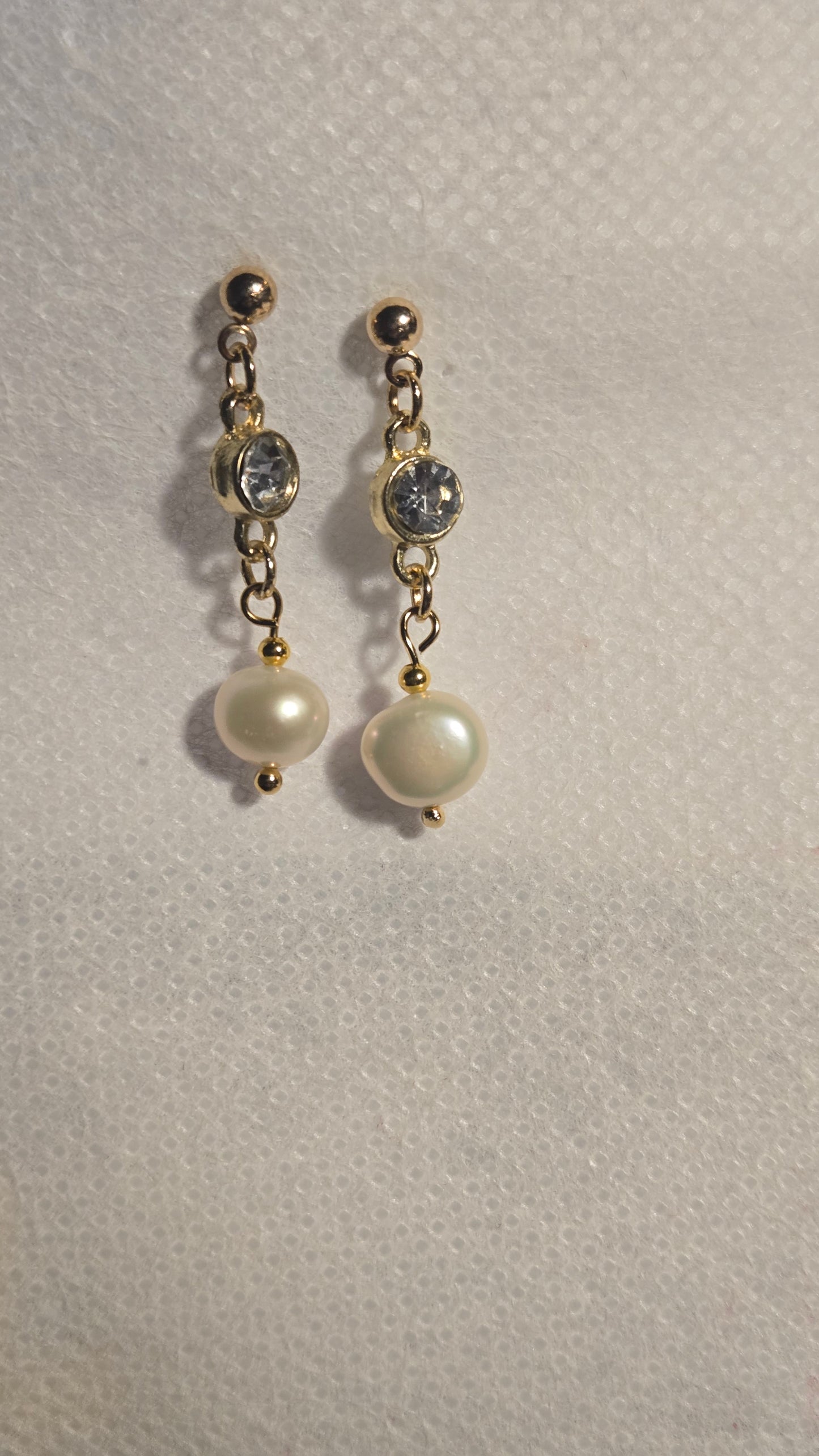 Golden Pearl Grace Drop Earrings with sparkling crystal accent on a white background