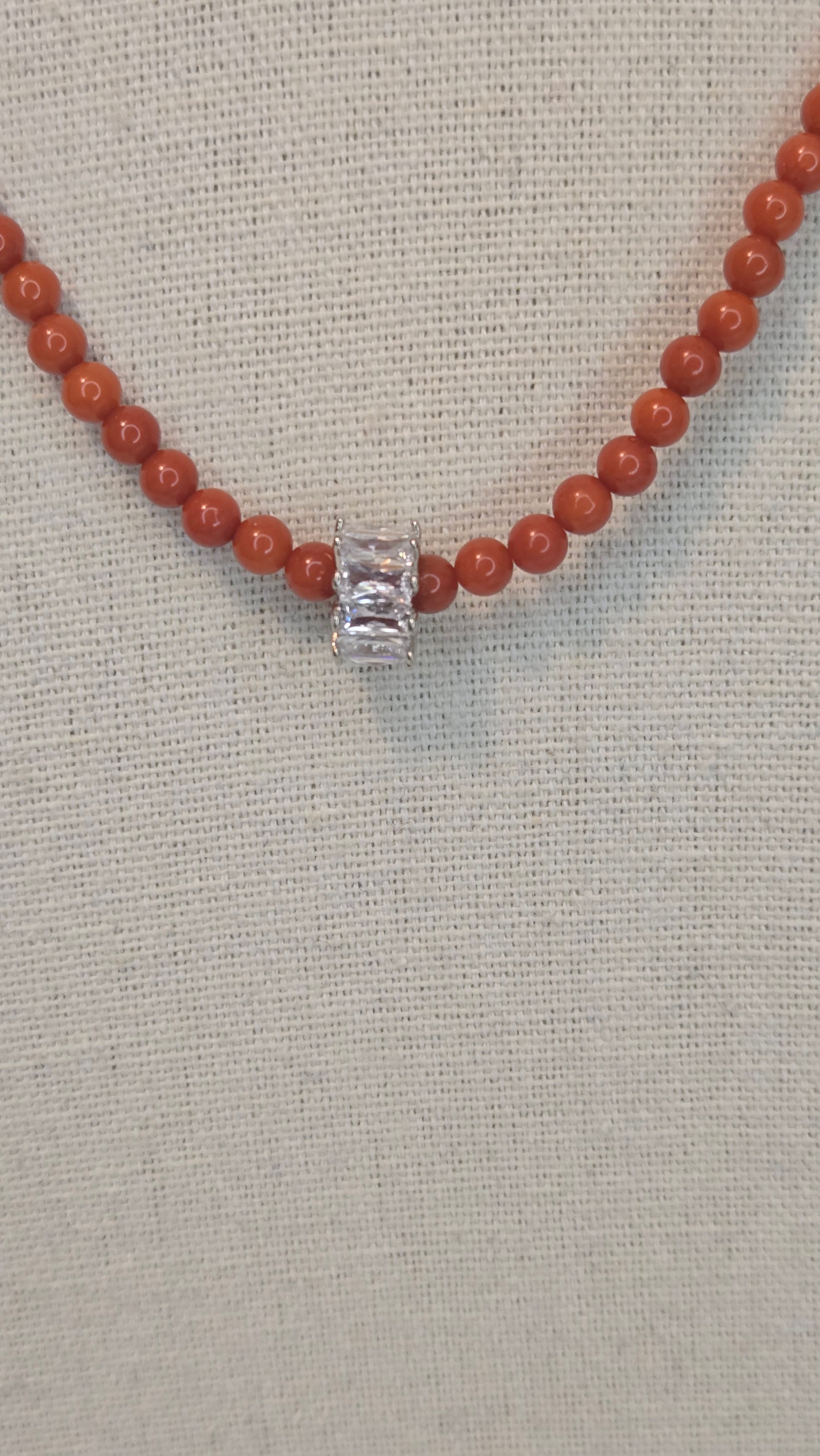 LuluTouch artisan bracelet showcasing unique tiger eye stones and lustrous pearls.