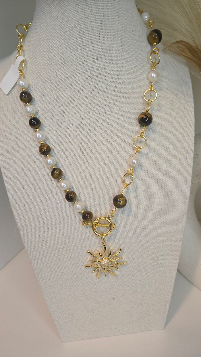 Tiger Eye Sun Necklace with tiger eye stones, pearls and gold-tone sun charm