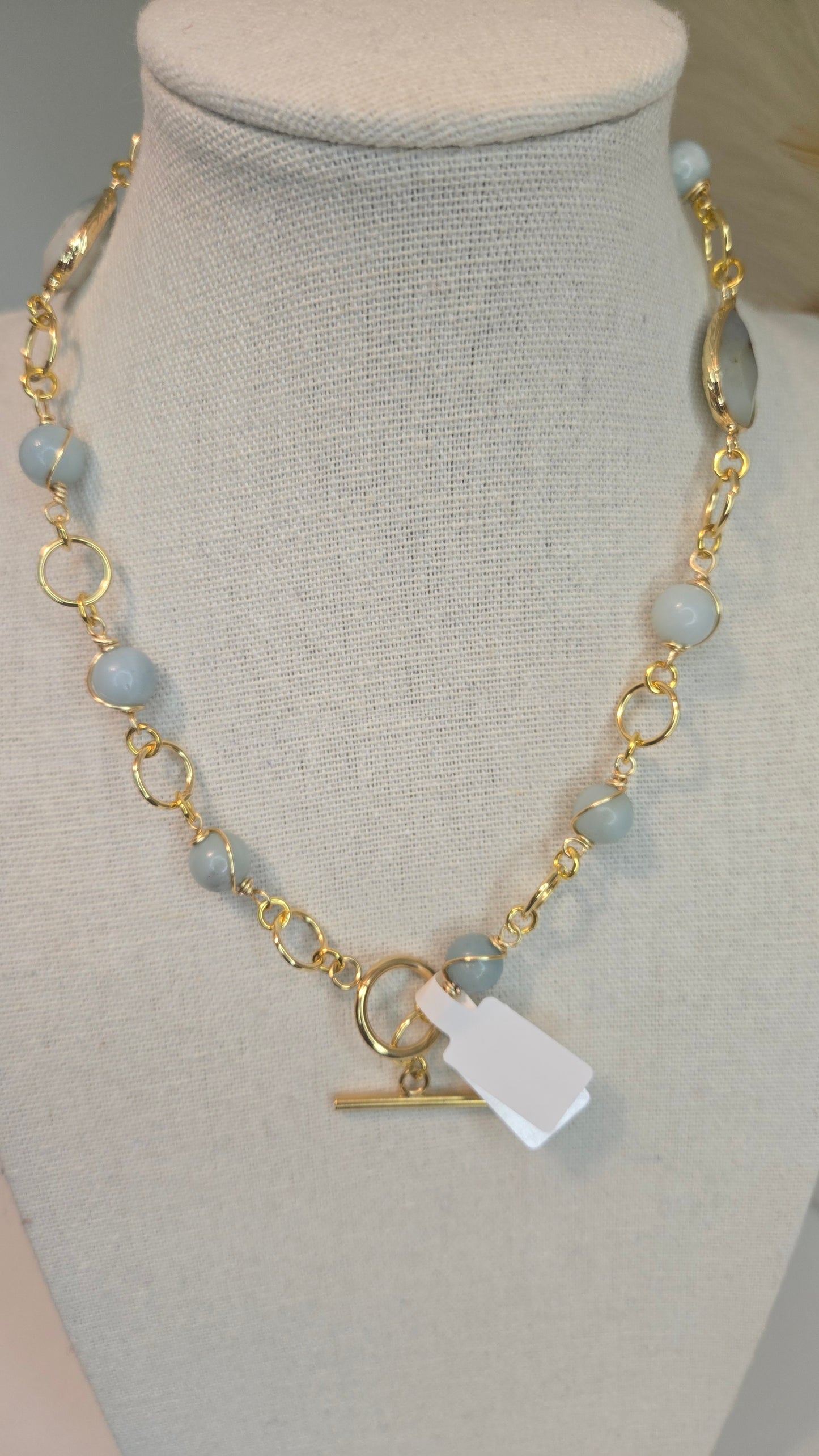 Model wearing Amazonite & Agate Necklace, highlighting how it drapes elegantly around the neck, paired with a simple outfit.
