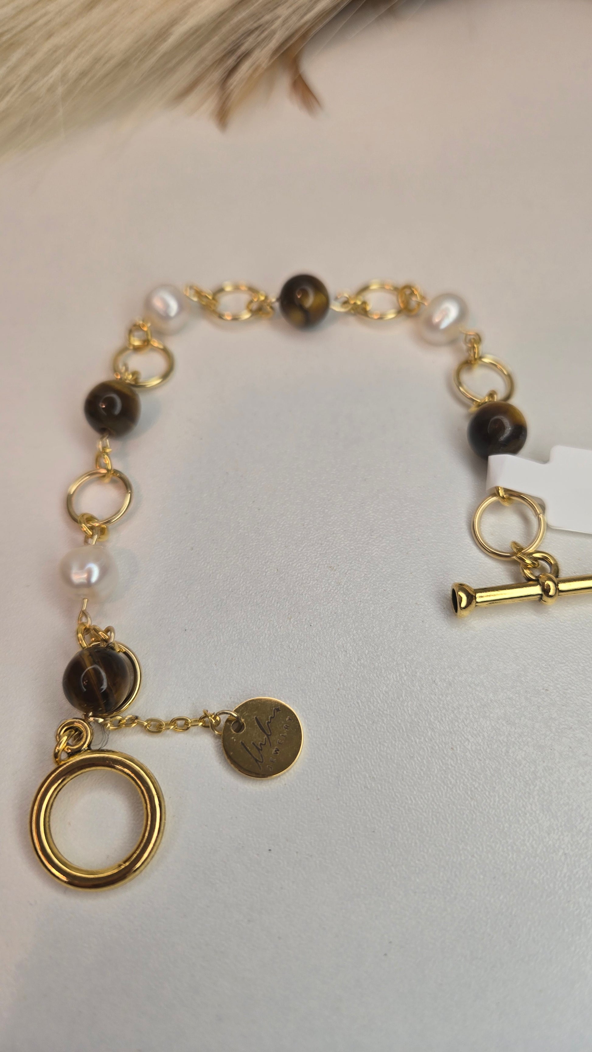 Royal Tiger Eye Bracelet with multiple angles showcasing its shine