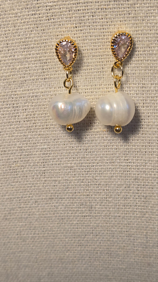 Close-up of Dew Pearl Earrings showcasing the lustrous pearls