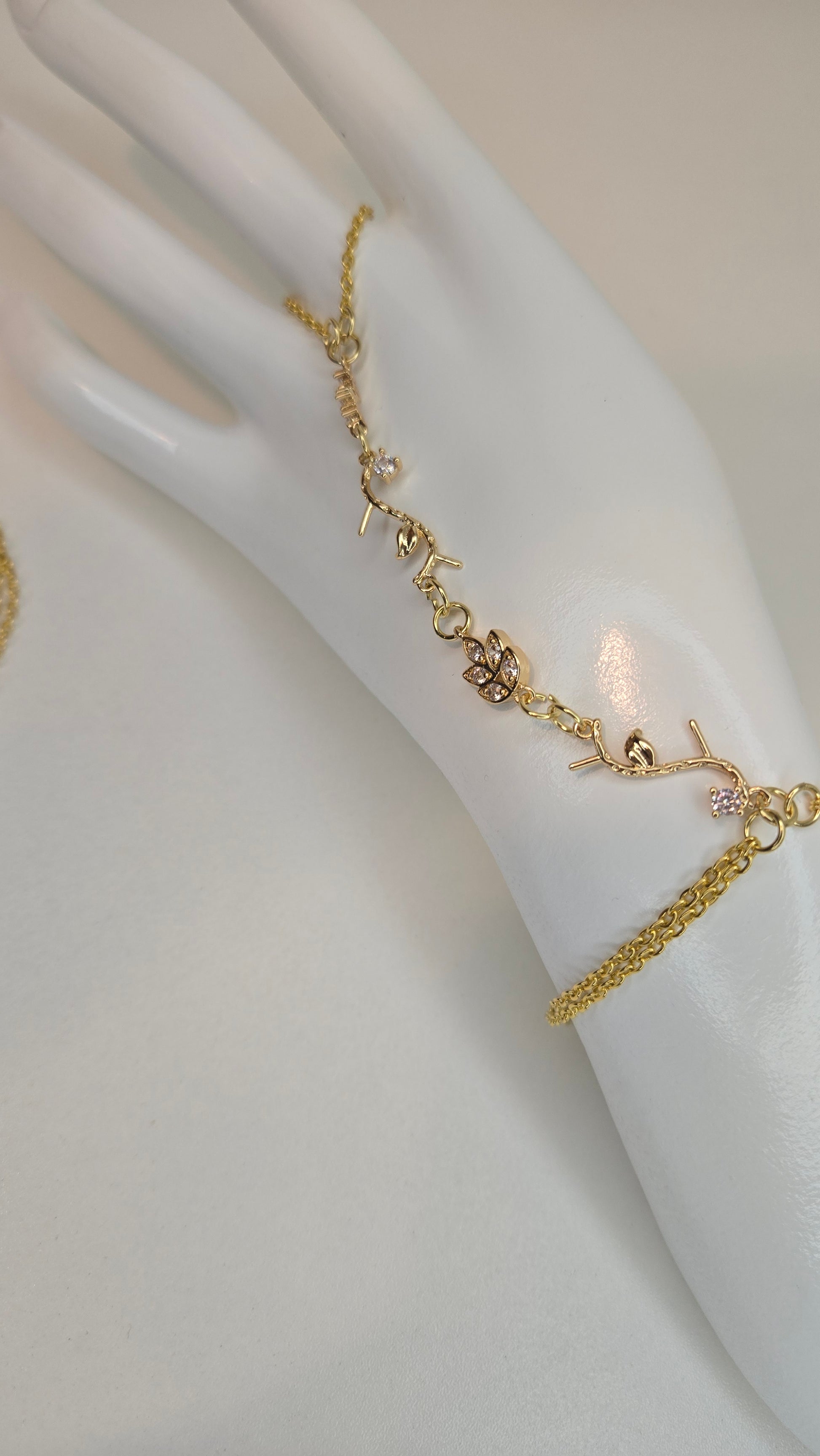 Elegant Hand Chain Bracelet on a decorative background