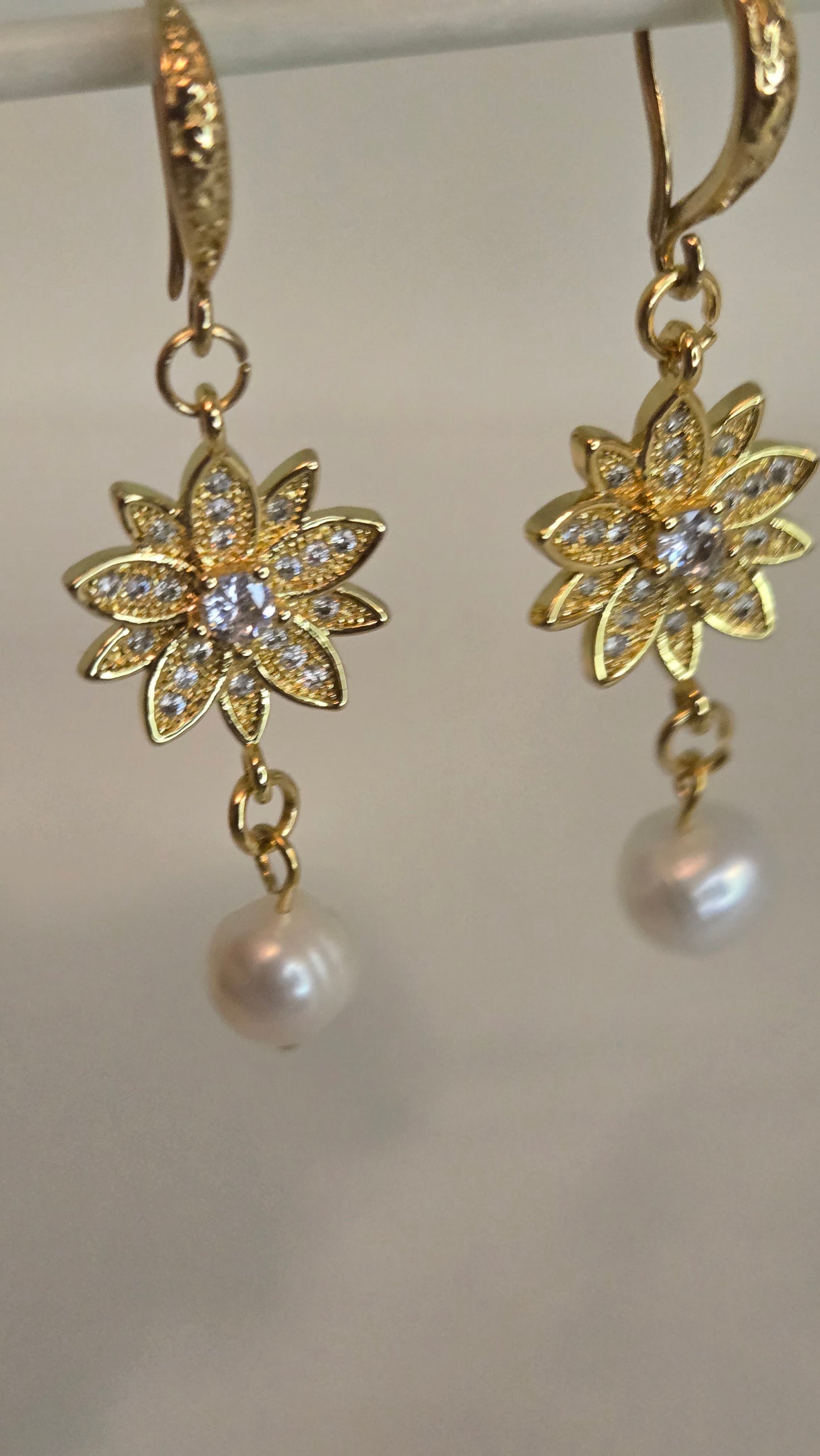 Beautiful Pearl Bloom Earrings presented elegantly