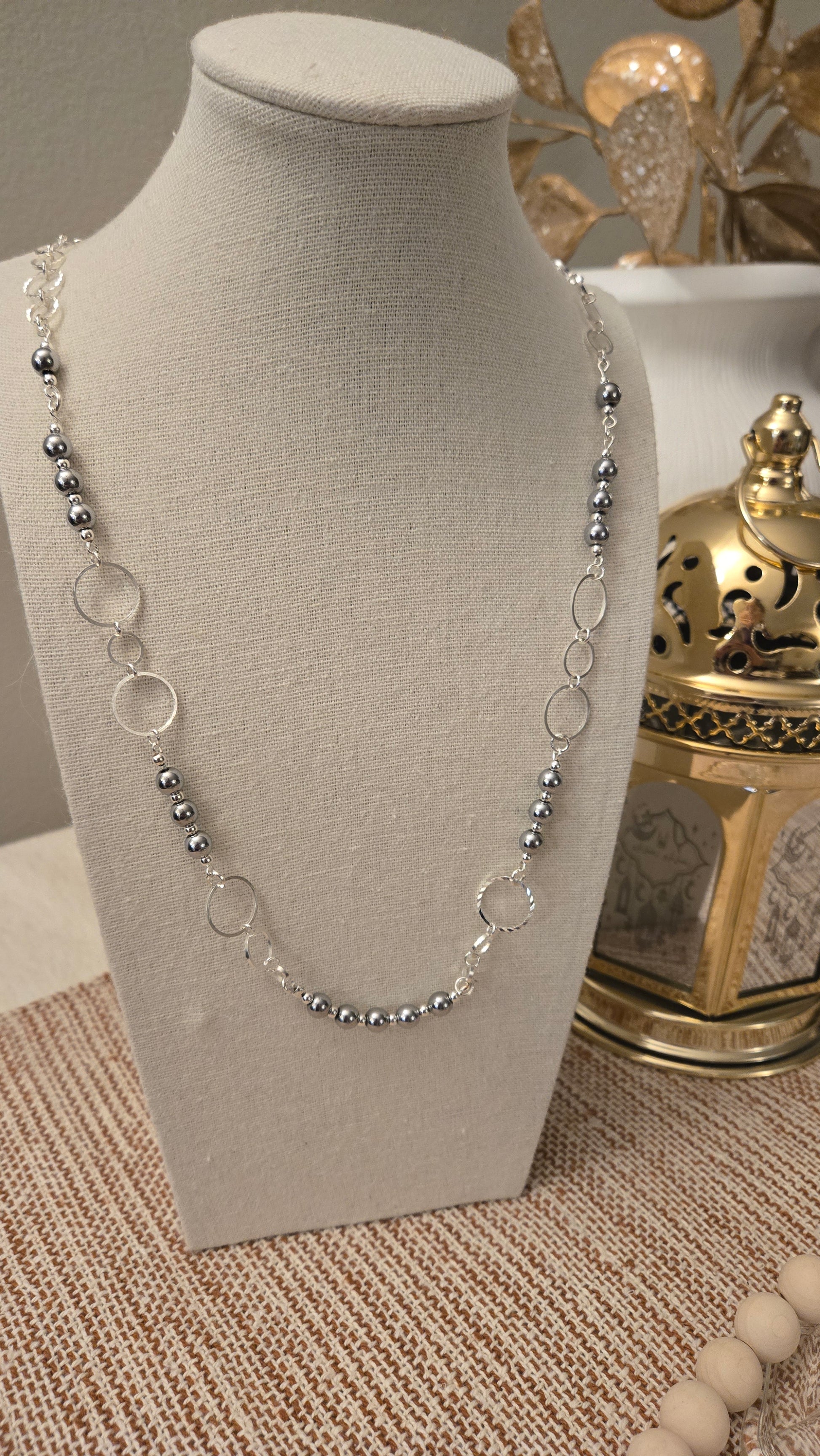 Natural Hematite Necklace elegantly displayed on a neutral background