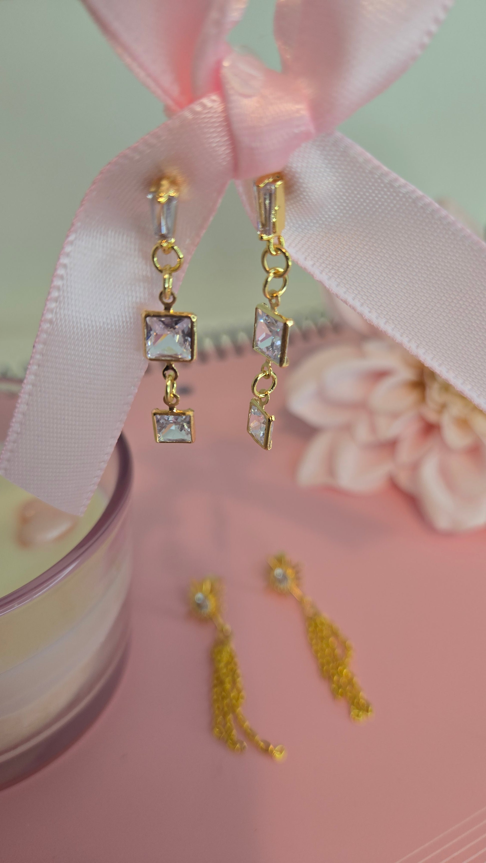 Elegant gold earrings with a subtle feminine touch
