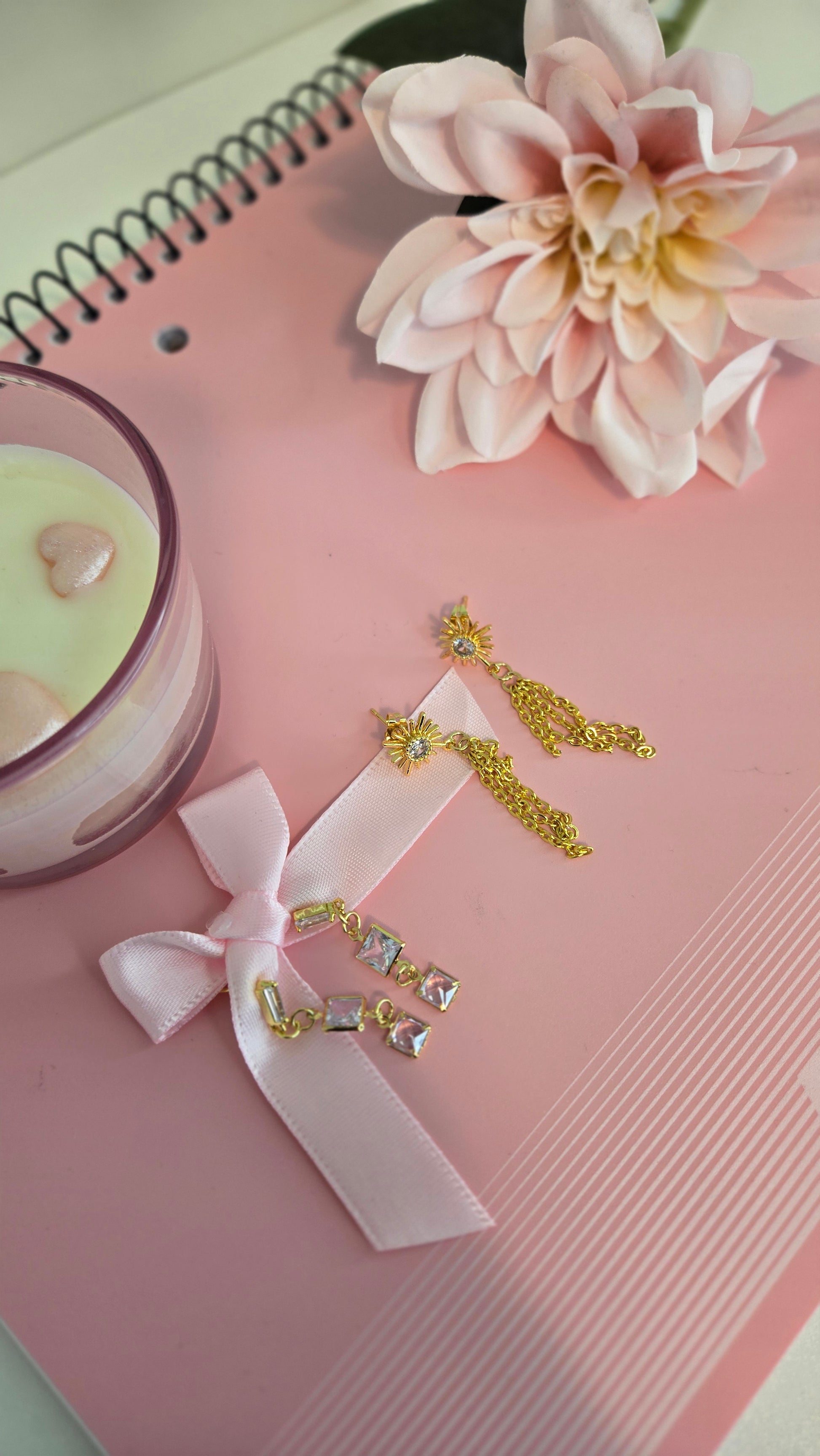 Artisan-crafted gold earrings, showcasing texture