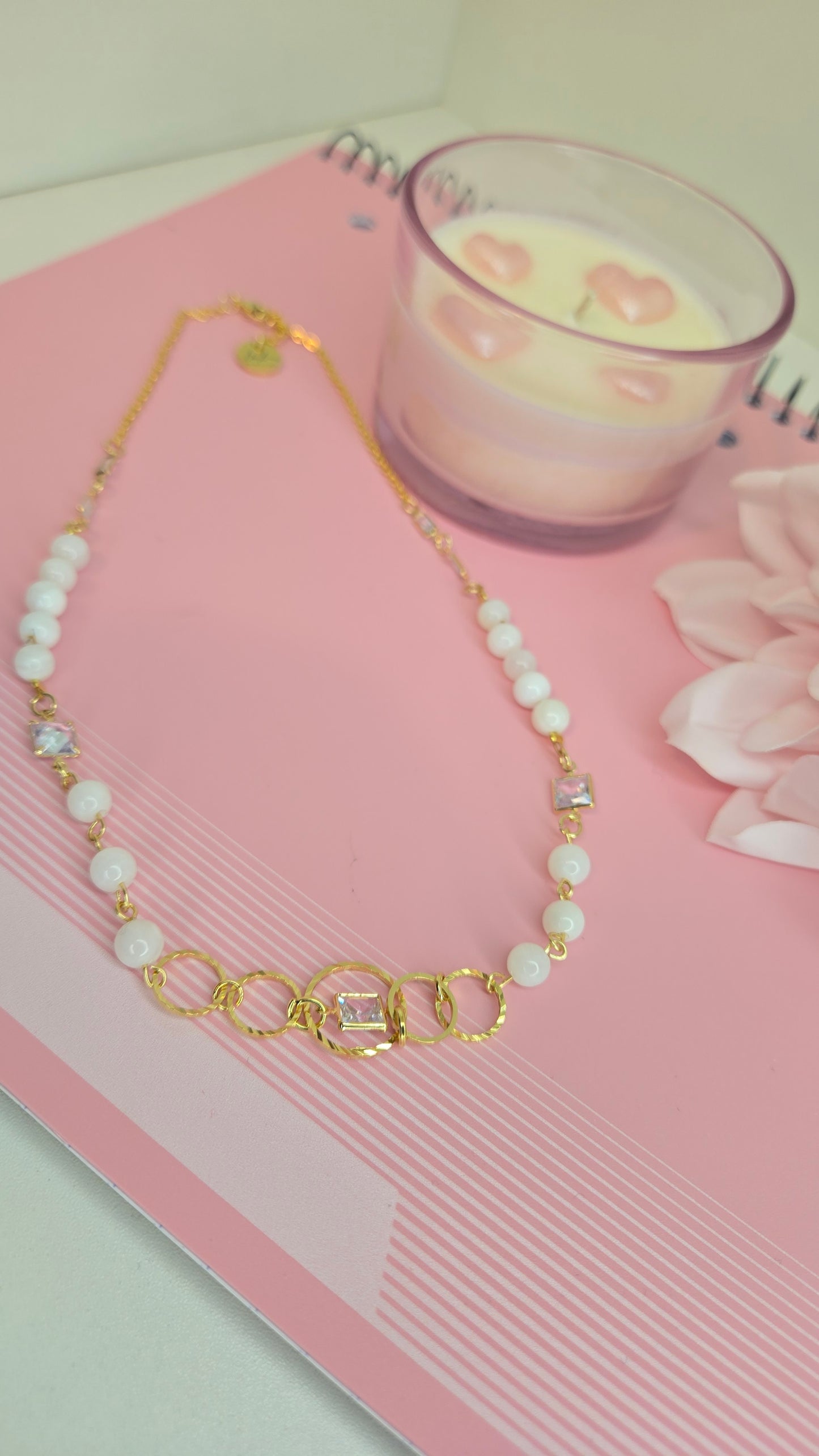 Dream Pearl Necklace displayed on a velvet stand, highlighting its delicate design