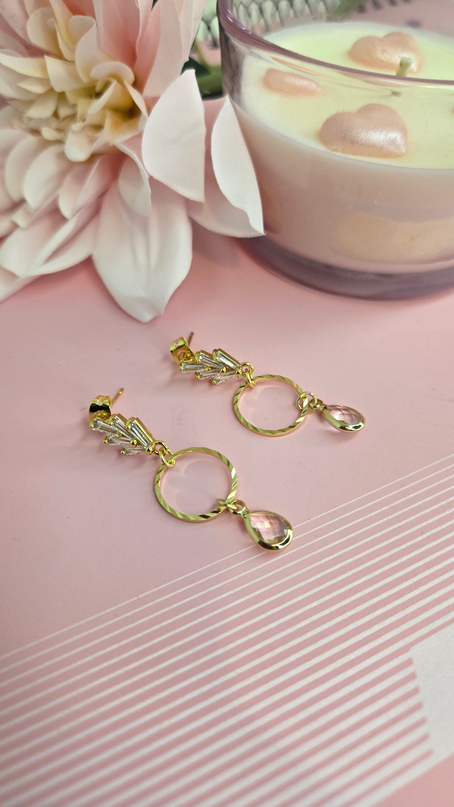 Delicate gold floral earrings, perfect for a spring look