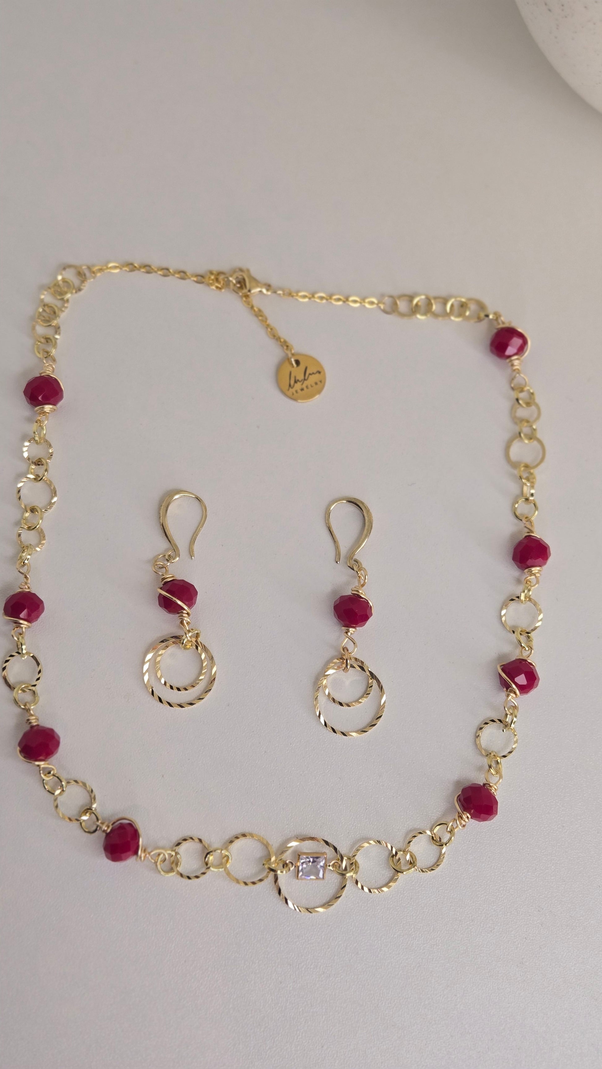 Golden Ruby Charm Set styled with fashionable outfits