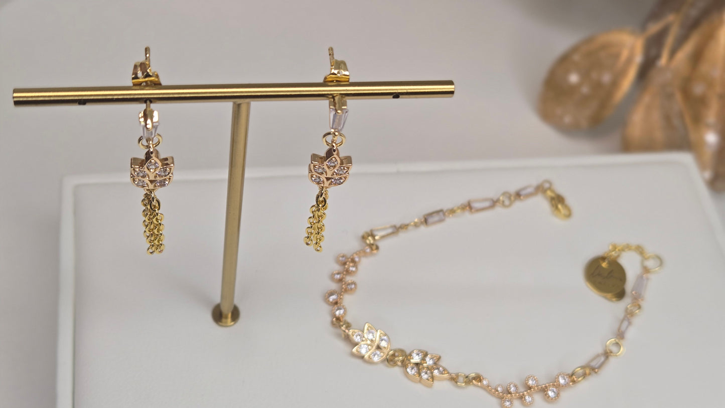 The Elegance Whisper Set artfully arranged next to a fresh flower for inspiration