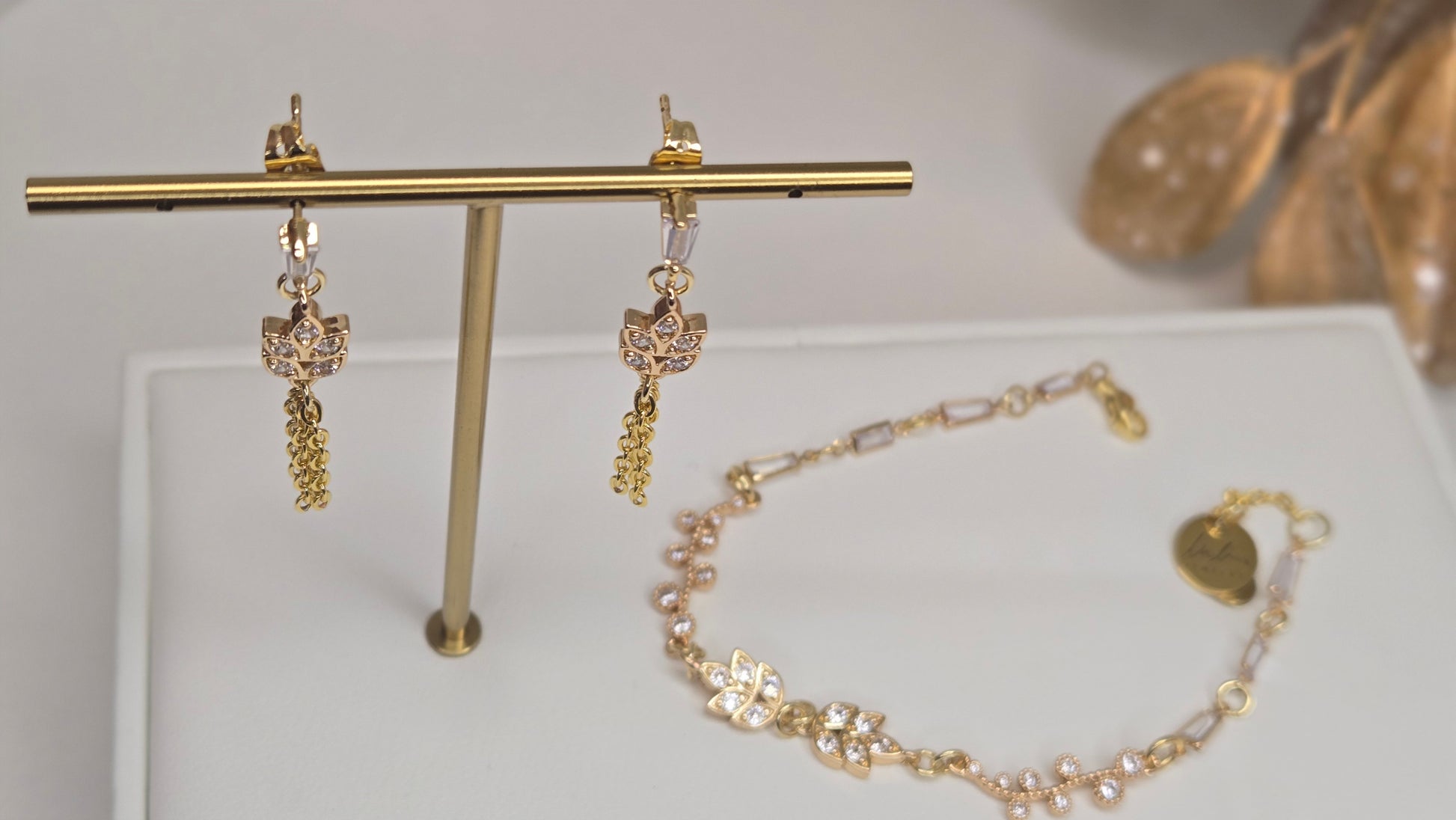 The Elegance Whisper Set artfully arranged next to a fresh flower for inspiration