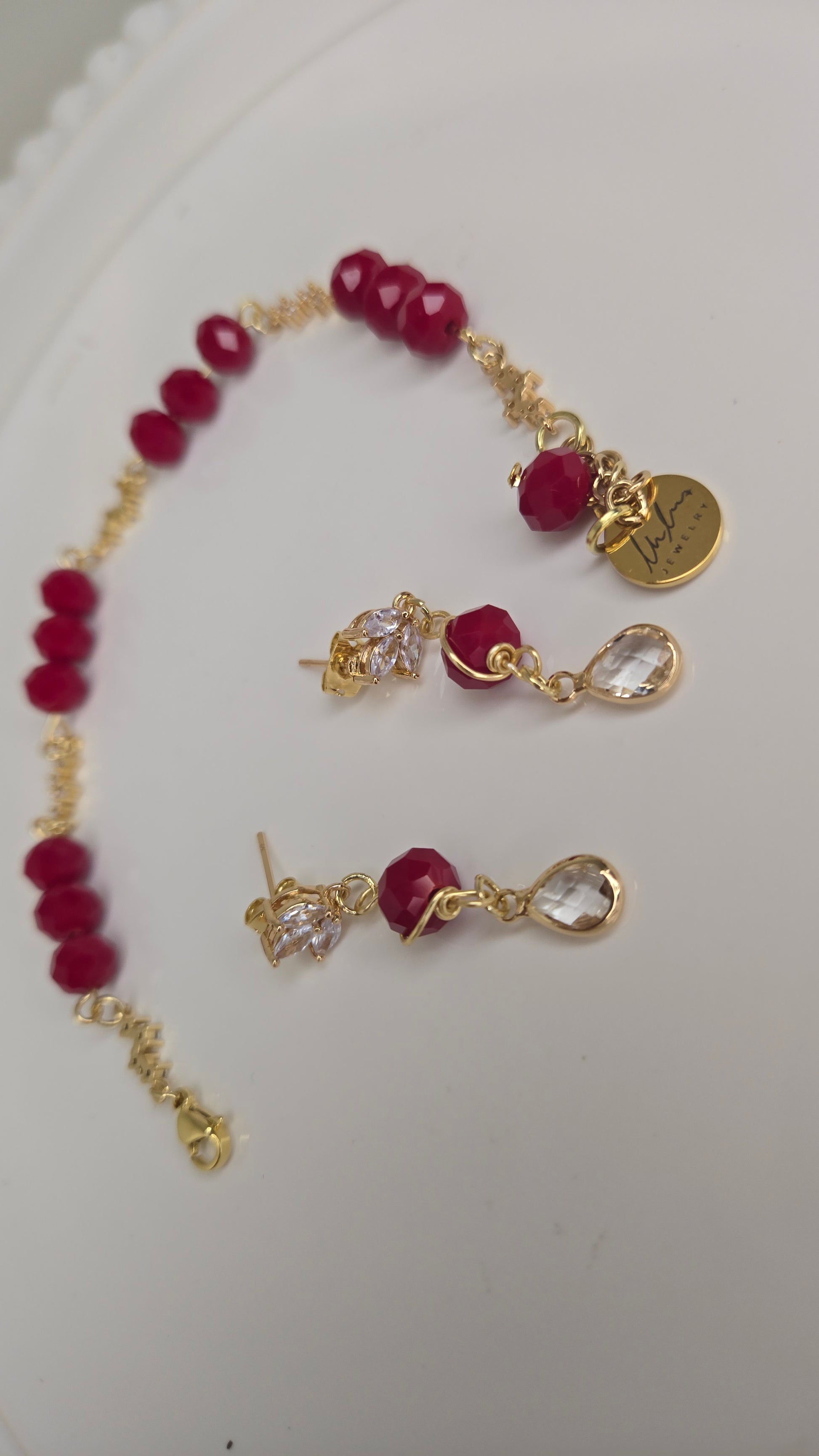 Elegant Red Crystal jewelry set with a vibrant display