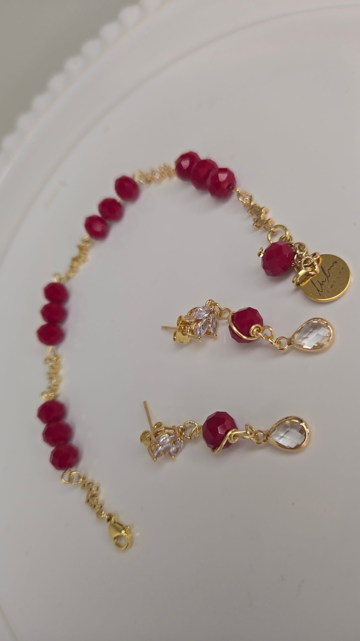 Elegant Red Crystal jewelry set on a soft background