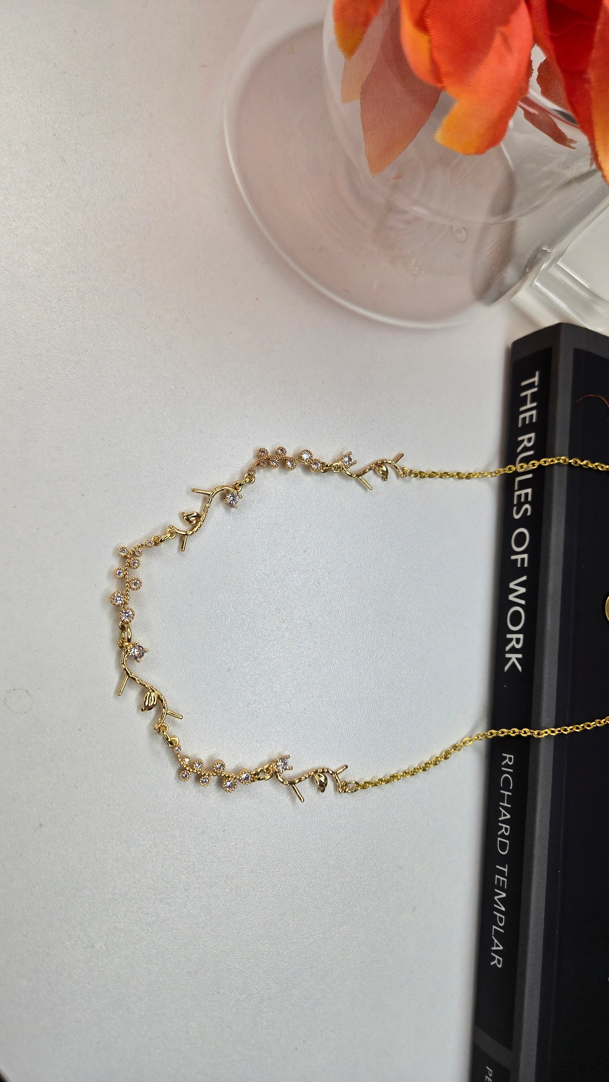 Model wearing the Golden Branch Necklace in natural light