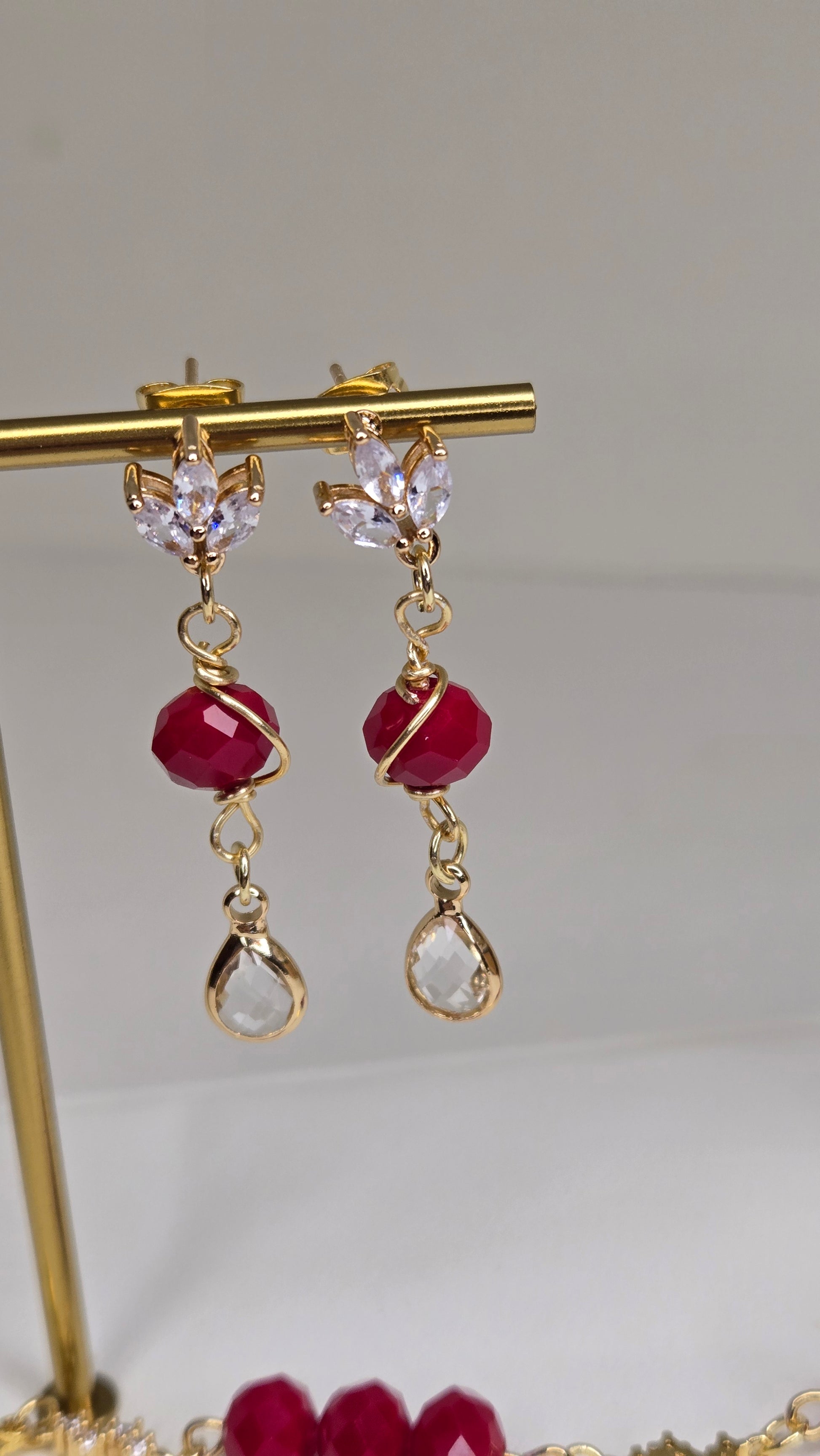 Detailed view of the Elegant Red Crystal jewelry pieces
