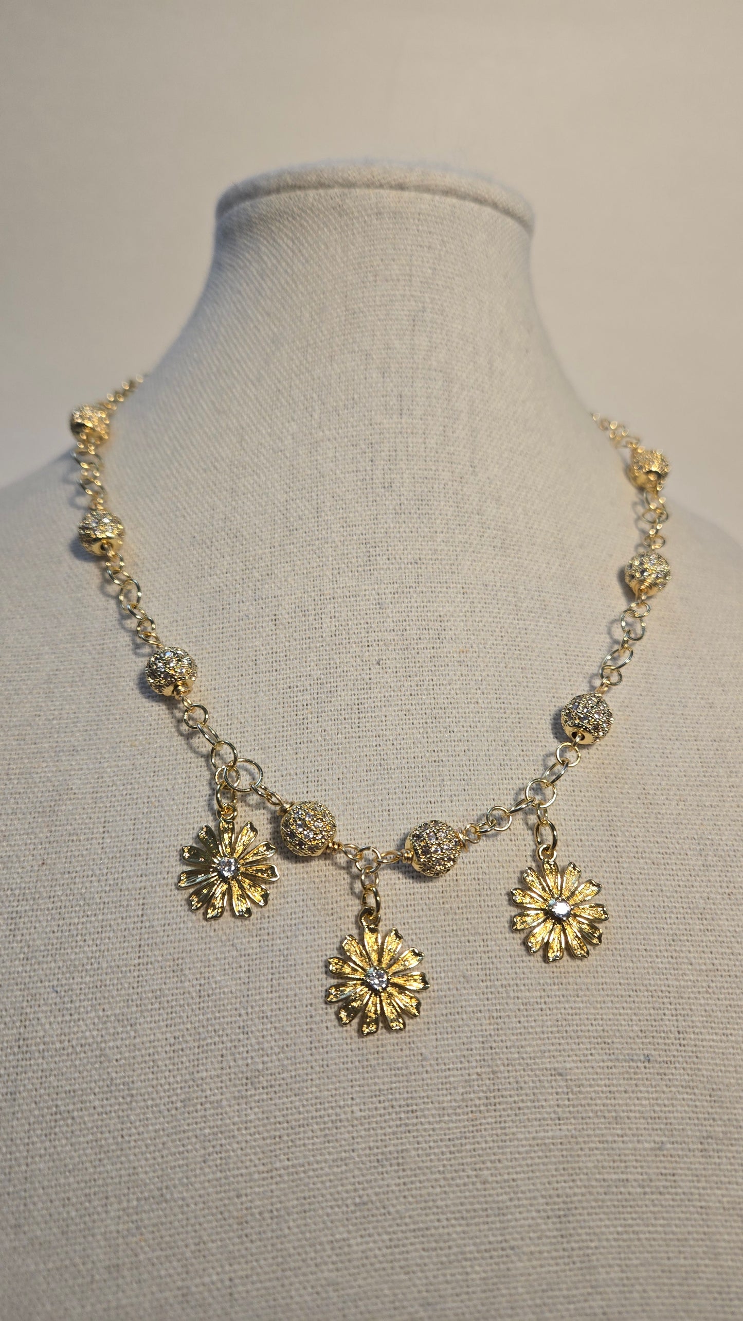 Model wearing Bloom Radiance Necklace in an elegant setting