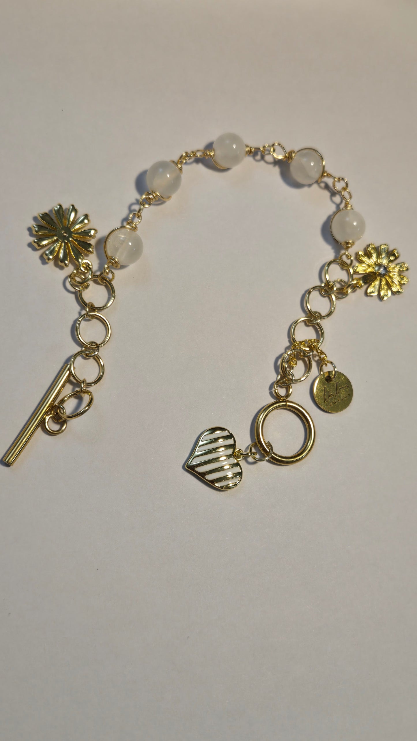 Floral Grace Bracelet elegantly styled on a mannequin