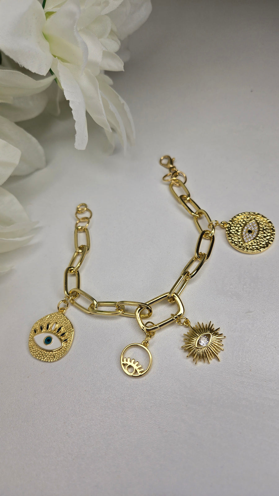 Golden Evil Eye Charm Bracelet with evil eye and star charms