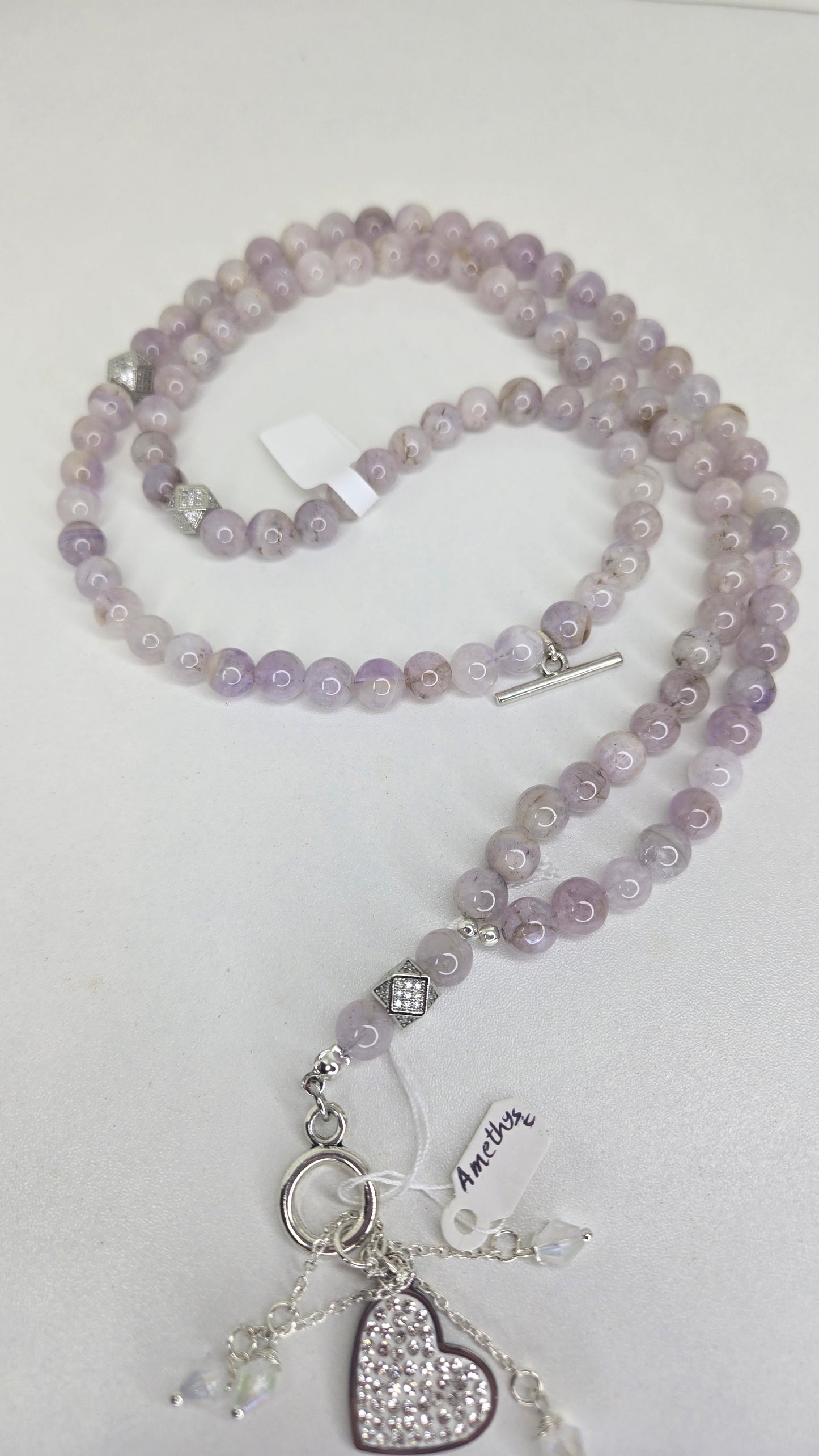 A luxurious tasbih crafted with elegant red jade stones and gold zircon-studded accents for a refined and sophisticated finish. The rich red tones combined with sparkling gold details create a timeless and graceful look.