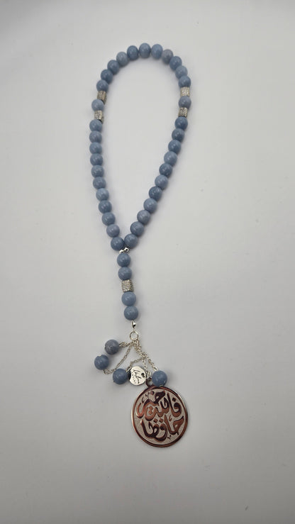 Gemstone Tasbih Collection, four bead tasbihs with Arabic calligraphy medallions, view 2