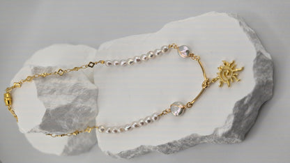 Pearl Radiance Necklace with irregular pearl beads, gold-tone chain and sun pendant, view 6