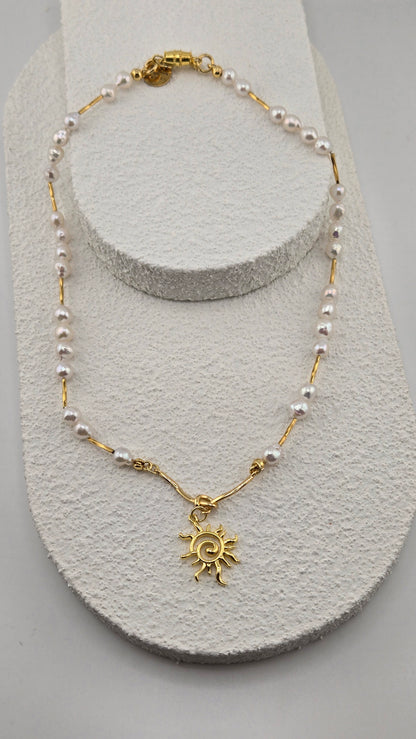 Pearl Sun Necklace with irregular white pearl beads and a gold-tone sun pendant, view 6