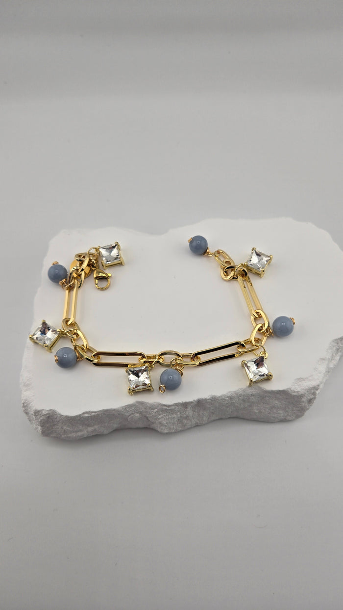 Heaven Blue Bracelet with sky-blue angelite beads, zircon accents and gold-plated details