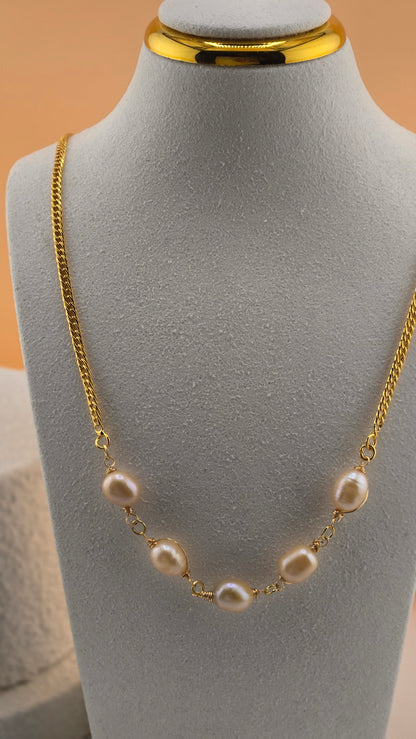 Lumi Pearl Necklace with champagne freshwater pearls on a gold-tone chain