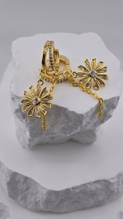 Daisy Cascade Earrings with dangling daisy charms on gold-tone chains, view 3