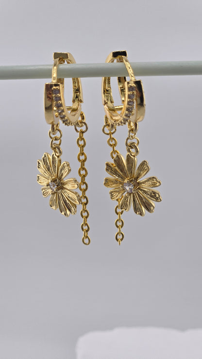 Daisy Cascade Earrings with dangling daisy charms on gold-tone chains, view 4