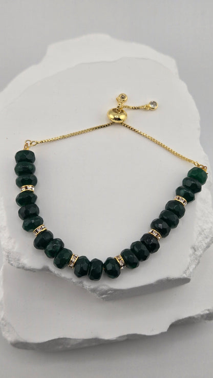 Royal Green Jade Bracelet with faceted green jade beads and gold-tone details