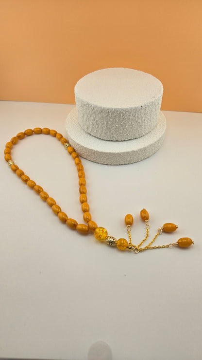 Golden Honey Tasbih with amber and honey-toned beads and ornate gold-tone spacers, view 11