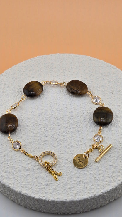 Tiger Eye Luxe Bracelet with brown tiger eye beads and dangling gold-tone charms, view 2