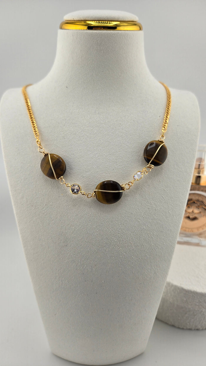 Golden Earth Necklace with brown tiger eye gemstones and clear accents on a gold-tone chain