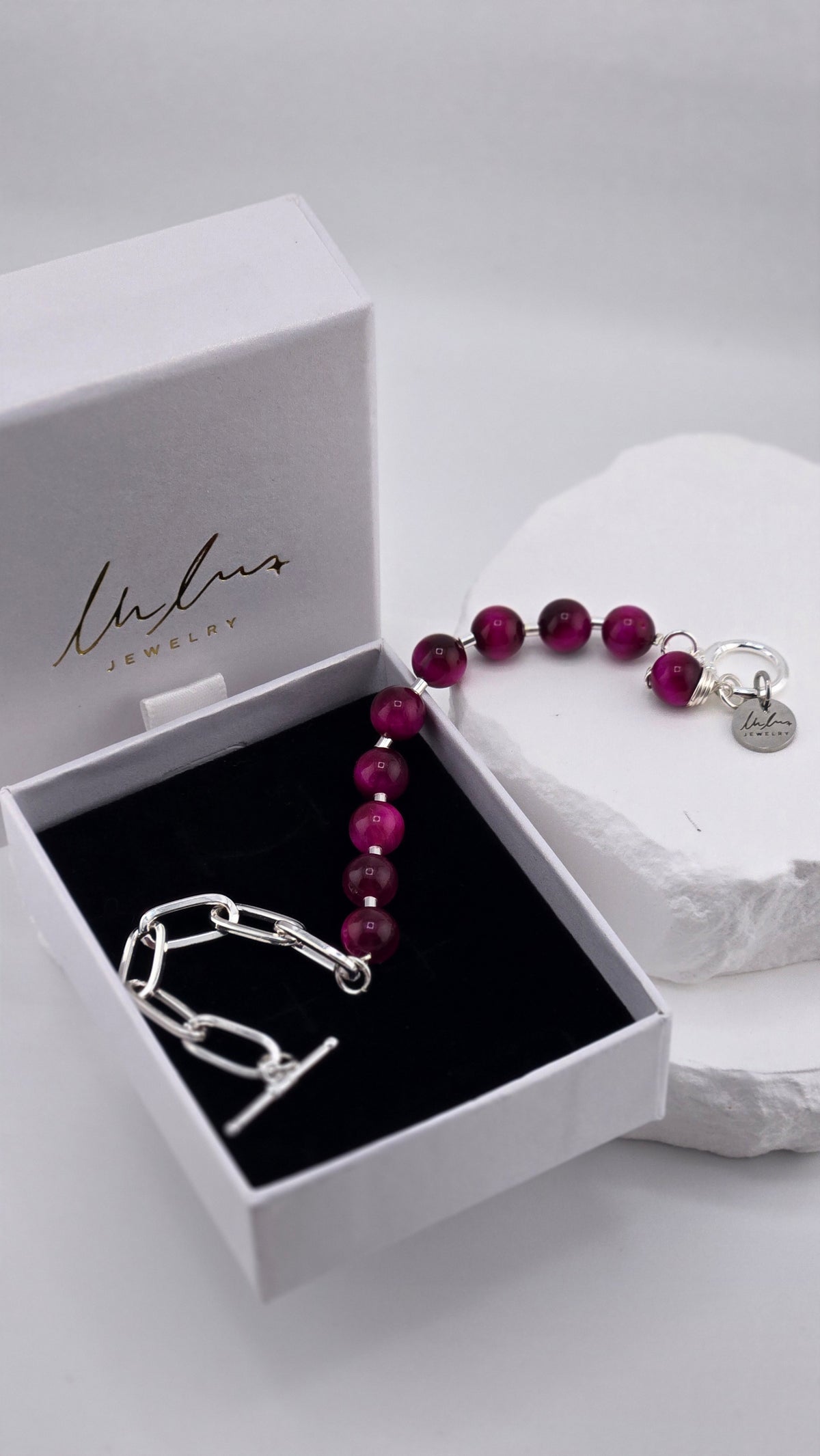 Berry Glow Tiger's Eye Bracelet with fuchsia tiger's eye beads, sterling silver spacers and silver-plated paperclip chain, view 3