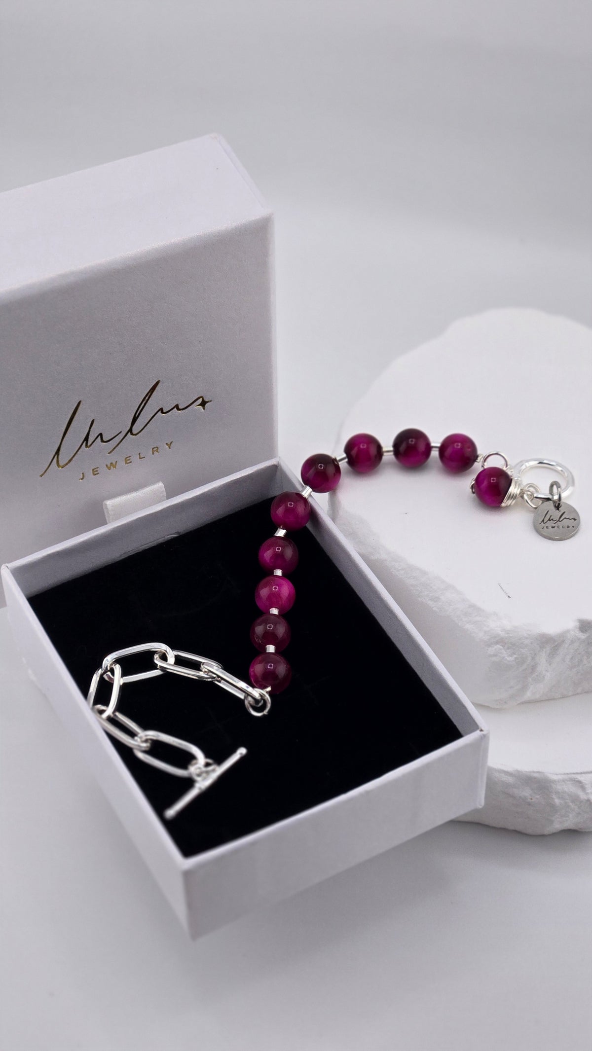 Berry Glow Tiger's Eye Bracelet with fuchsia tiger's eye beads, sterling silver spacers and silver-plated paperclip chain, view 2