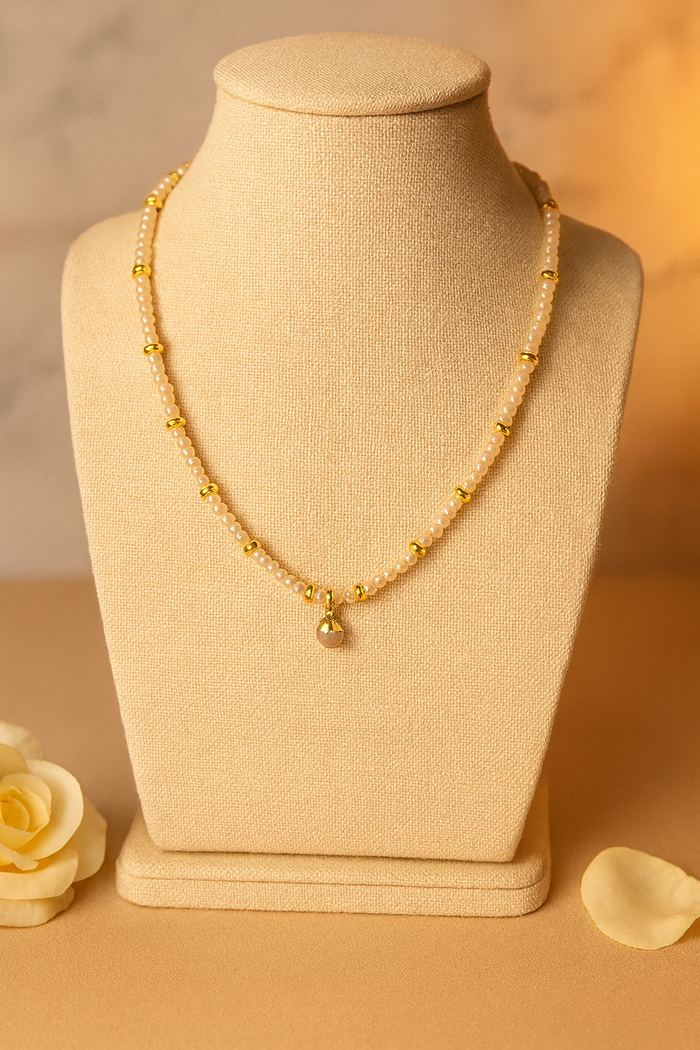 Pink Elegance Necklace with rose quartz stones and gold-tone rings