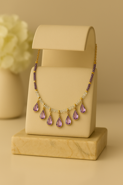 Lavender Drops Necklace with seven lavender teardrop drops on purple and clear beads