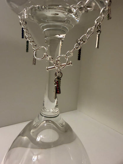 Chain Glow Silver-Tone Bracelet with oval links and dangling dark accents